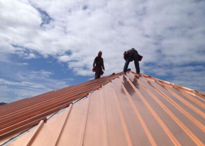 men on a roof